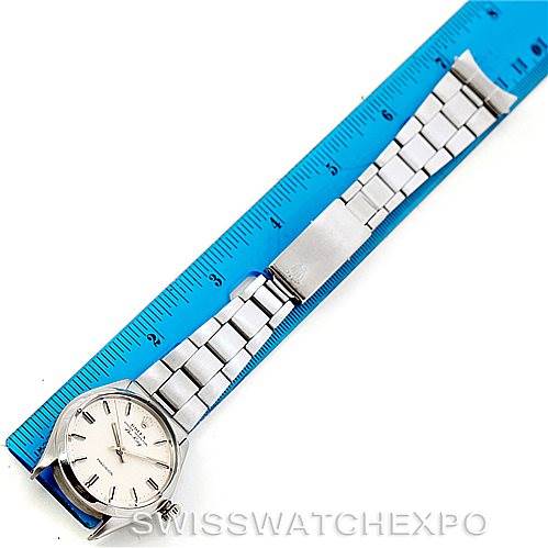 The image shows a Vintage Collection Rolex watch laid flat with a blue ruler for scale, displaying the face, bracelet, and clasp.