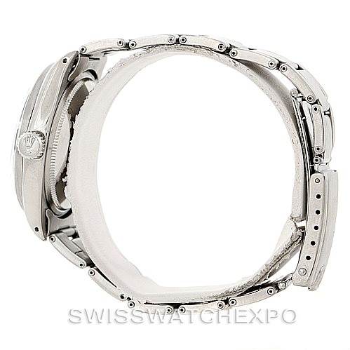 This image shows a side view of a Vintage Collection Rolex watch, focusing on the crown, case, and bracelet.