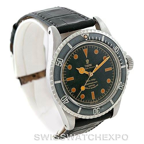 The image shows a Tudor Submariner 7928 Men's Stainless Steel Black Dial 7928 Men's Stainless Steel Black Dial watch at a three-quarter angle, highlighting the dial, bezel, and leather strap.