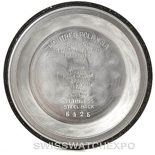 This image shows the inner case back of a Vintage Collection Rolex watch with engraved details about its origin and material.