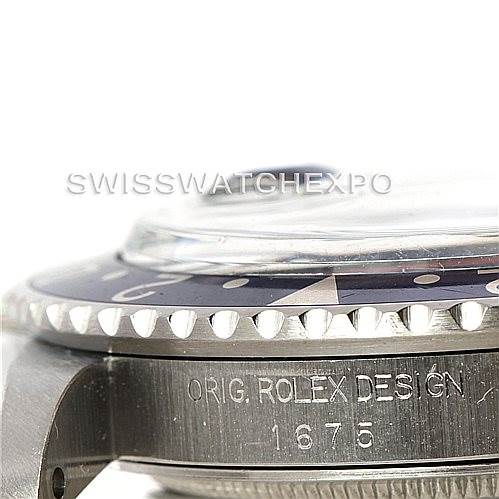 The image shows a close-up side view of the Rolex Vintage Collection 1675 Men's Stainless Steel Black Dial 1675 Men's Stainless Steel Black Dial model, focusing on the bezel and engraved case.