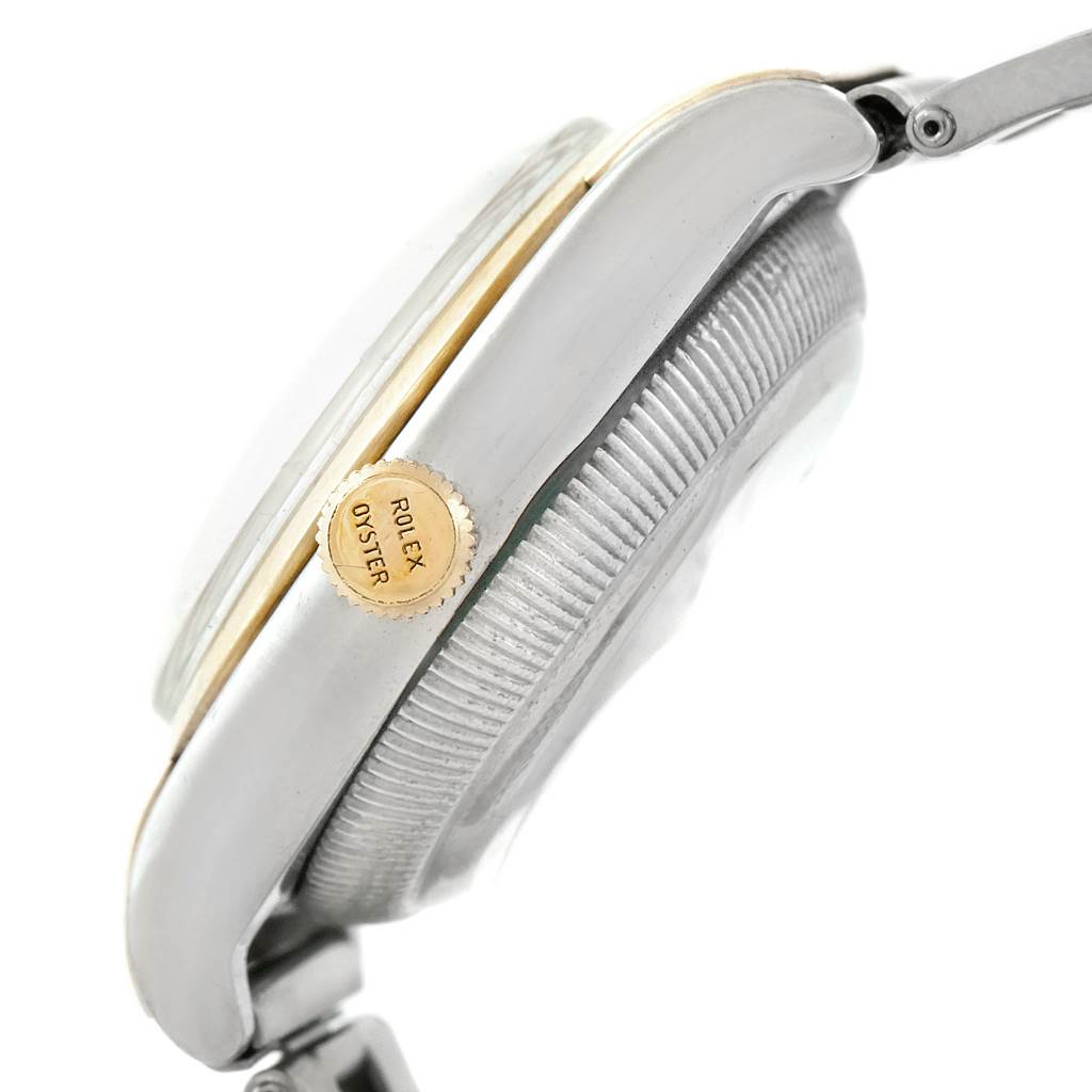 The image shows the side profile of the Rolex Vintage Collection 3065 Men's Steel and Gold (two tone) Champagne Dial 3065 Men's Steel and Gold (two tone) Champagne Dial watch, highlighting its crown, case, and part of the strap.