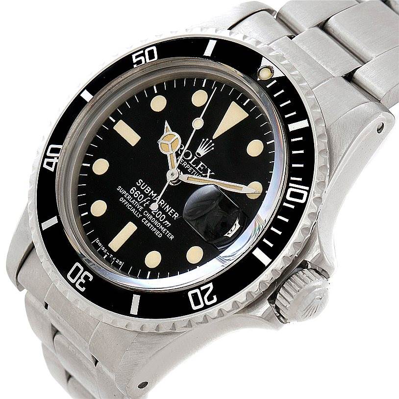 This image shows a close-up view of a Rolex Vintage Collection 1680 Men's Stainless Steel Black Dial 1680 Men's Stainless Steel Black Dial Submariner watch, highlighting the dial, bezel, and crown.