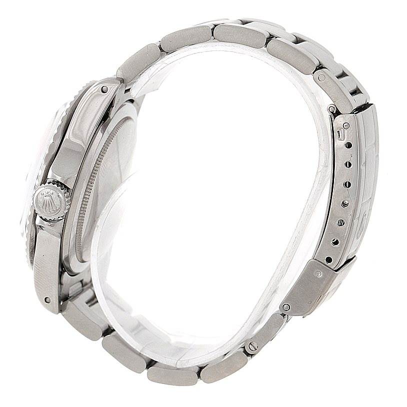 This image shows a side view of the Rolex Vintage Collection 1680 Men's Stainless Steel Black Dial 1680 Men's Stainless Steel Black Dial watch, highlighting the crown, case, and metal bracelet.