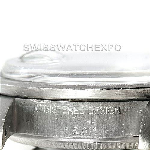 The image shows a close-up side view of the Rolex Vintage Collection 1501 Men's Stainless Steel Silver Dial 1501 Men's Stainless Steel Silver Dial model, highlighting the case and engraved design details.