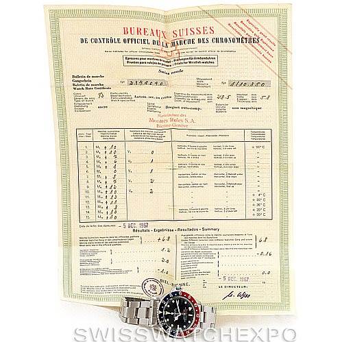 The image shows a Rolex Vintage Collection 1675 Men's Stainless Steel Black Dial 1675 Men's Stainless Steel Black Dial watch with a stainless steel bracelet, positioned in front of a Swiss chronometer certification document.