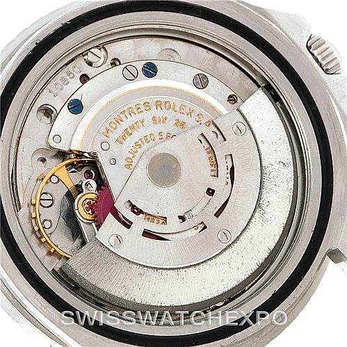 The image shows the back view of the inner mechanism of a Vintage Collection Rolex watch.