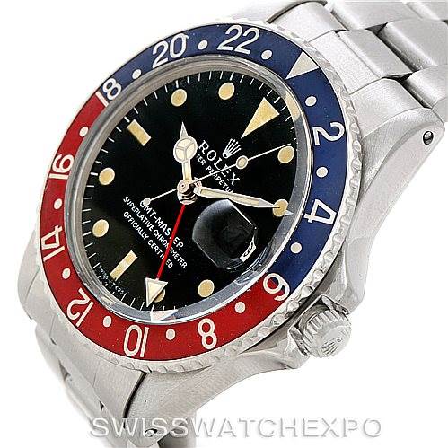 The image shows the Rolex Vintage Collection 1675 Men's Stainless Steel Black Dial 1675 Men's Stainless Steel Black Dial GMT-Master watch at a slight angle, displaying the face, bezel, and part of the bracelet.