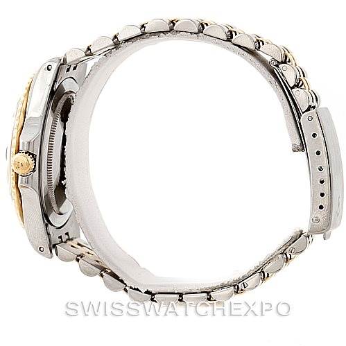 This side view of the Vintage Collection watch by Rolex shows the band, clasp, and side profile of the case.