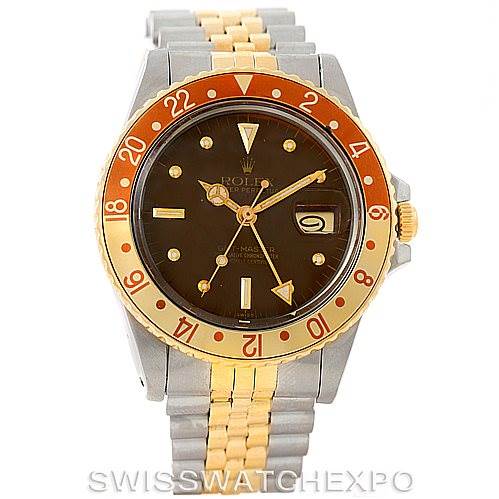 The image shows a front view of a Vintage Collection Rolex watch, highlighting its bicolor bracelet and red and gold bezel.