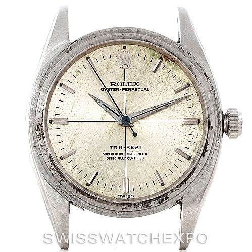 The image shows the front view of a Rolex Vintage Collection 6556 Men's Stainless Steel Silver Dial 6556 Men's Stainless Steel Silver Dial Tru-Beat watch, highlighting its dial, hands, and crown.