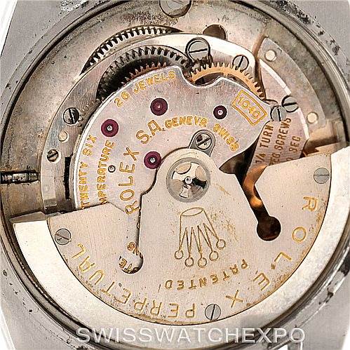 A close-up shot of the internal mechanism and movement of the Vintage Collection model by Rolex is shown.