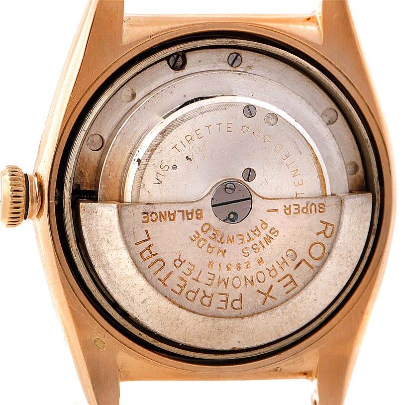 The image shows the internal mechanism and rotor of the Rolex Vintage Collection 3131 Men's Yellow Gold Silver Dial 3131 Men's Yellow Gold Silver Dial watch from the back.