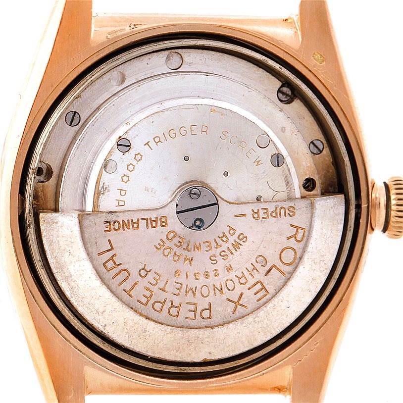 This is a close-up view of the movement inside a Rolex Vintage Collection 3131 Men's Yellow Gold Silver Dial 3131 Men's Yellow Gold Silver Dial watch, showing the mechanism and engravings.