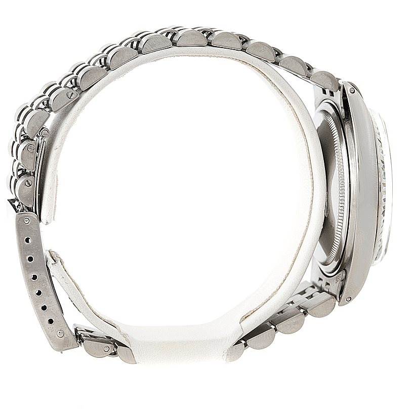 The image shows a side profile of a Rolex Vintage Collection 1601 Men's Stainless Steel Silver Dial 1601 Men's Stainless Steel Silver Dial watch, highlighting its bracelet and partially visible case.