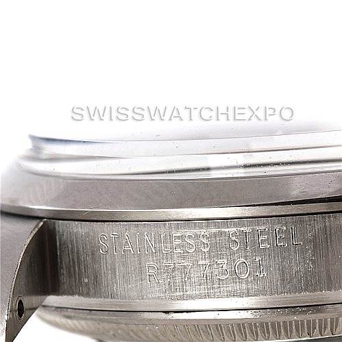 This close-up image shows the engraved stainless steel case back of a Rolex Vintage Collection 15000 Men's Stainless Steel Blue Dial 15000 Men's Stainless Steel Blue Dial model watch.