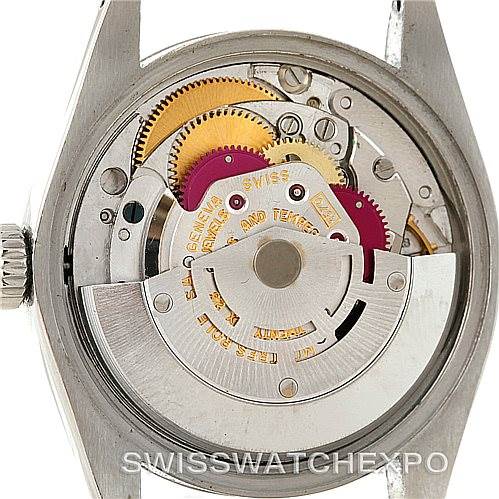 The image shows the inner mechanism and gears of a Rolex Vintage Collection 1500 Men's Stainless Steel White Dial 1500 Men's Stainless Steel White Dial watch, viewed from the back.