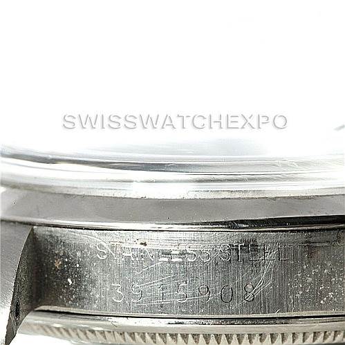 Close-up of the side of the Rolex Vintage Collection 1500 Men's Stainless Steel White Dial 1500 Men's Stainless Steel White Dial watch, showing the stainless steel case and engraved serial number.