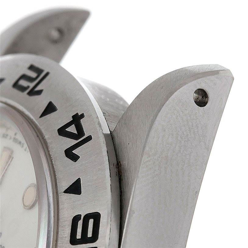 This image shows a close-up angle of the bezel and lugs of a Rolex Vintage Collection 16550 Men's Stainless Steel Beige Dial 16550 Men's Stainless Steel Beige Dial model watch.