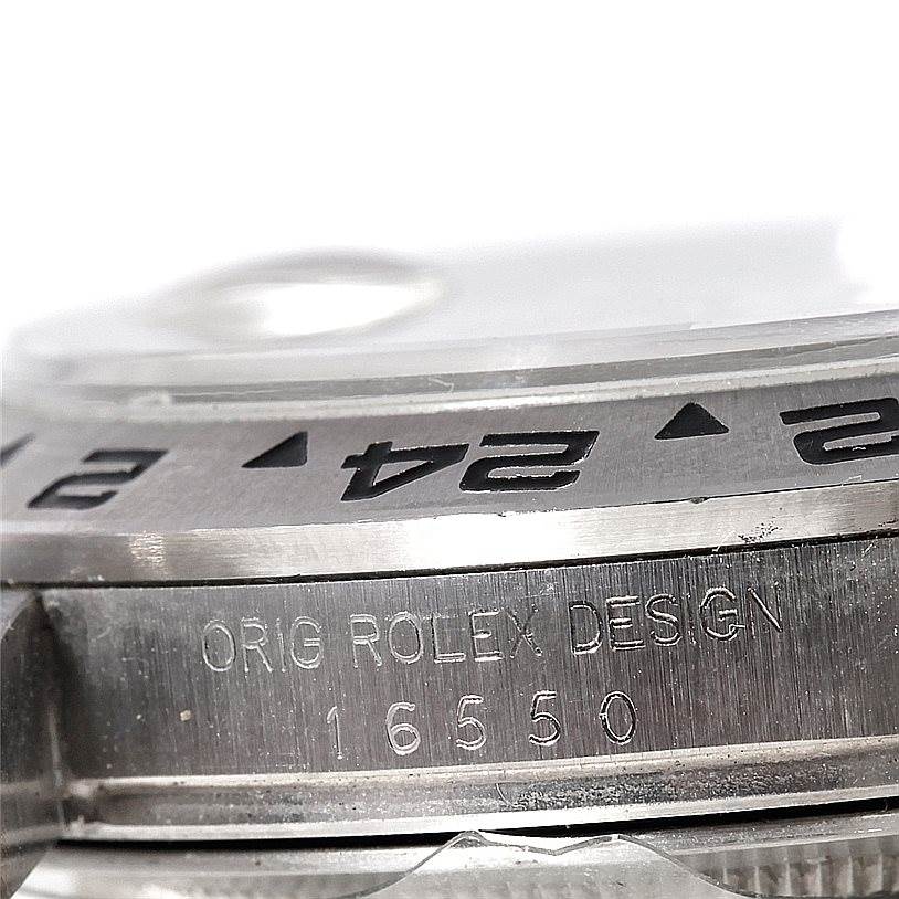 This close-up image shows the bezel and part of the case with the model number of the Rolex Vintage Collection 16550 Men's Stainless Steel Beige Dial 16550 Men's Stainless Steel Beige Dial watch.