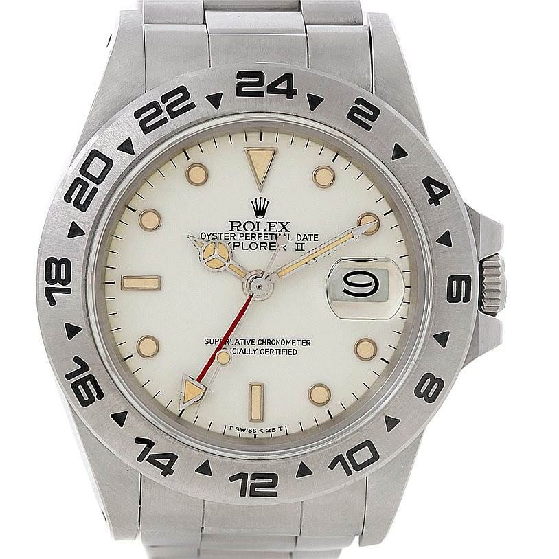 This image shows a frontal view of the Rolex Vintage Collection 16550 Men's Stainless Steel Beige Dial 16550 Men's Stainless Steel Beige Dial Explorer watch's face and part of its metal band.
