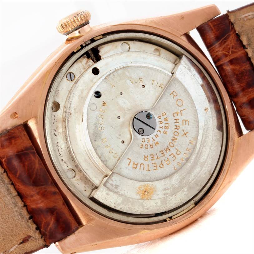 The image shows the exposed movement of a Rolex Vintage Collection 3131 Men's Rose Gold Silver Dial 3131 Men's Rose Gold Silver Dial watch viewed from the back.
