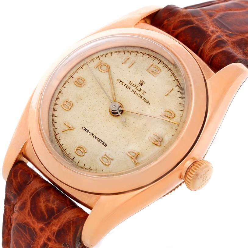 The Rolex Vintage Collection 3131 Men's Rose Gold Silver Dial 3131 Men's Rose Gold Silver Dial model is shown at an angle highlighting the face, crown, and part of the leather strap.