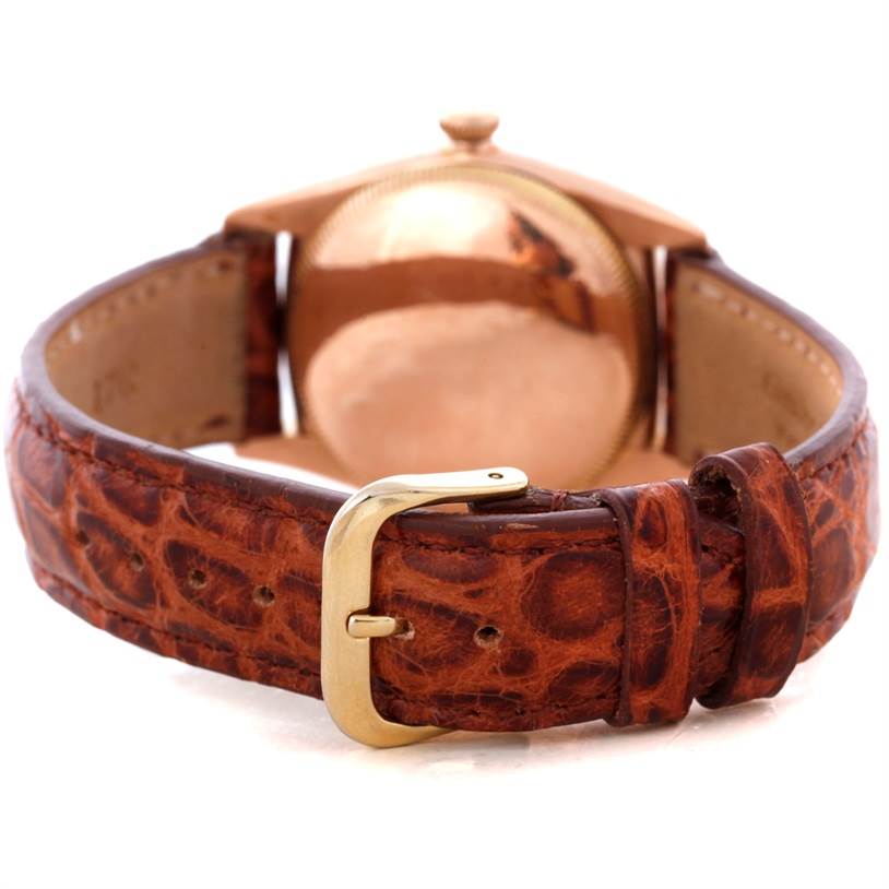 The image shows the back and buckle of a Rolex Vintage Collection 3131 Men's Rose Gold Silver Dial 3131 Men's Rose Gold Silver Dial watch with a textured leather strap.