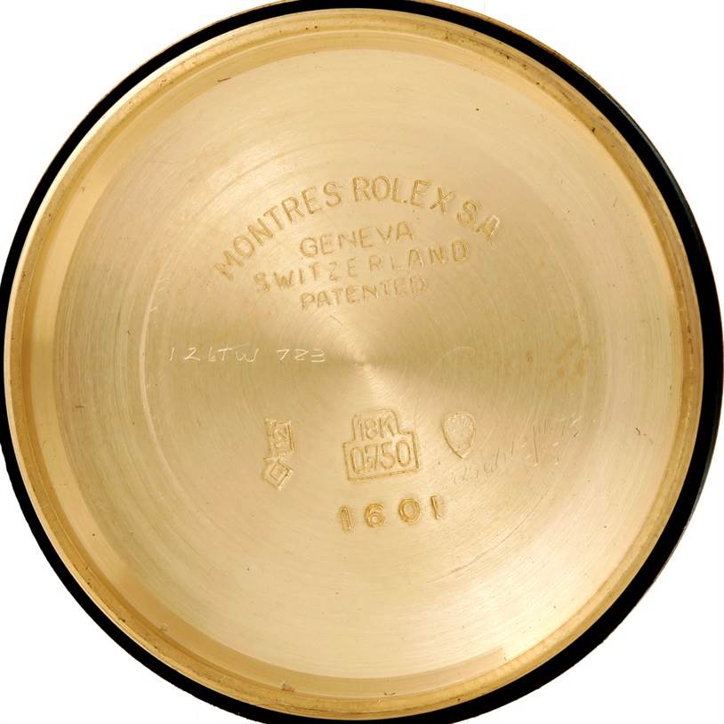 This image shows the inside of the case back engraved with "1601" of a Vintage Collection Rolex watch.
