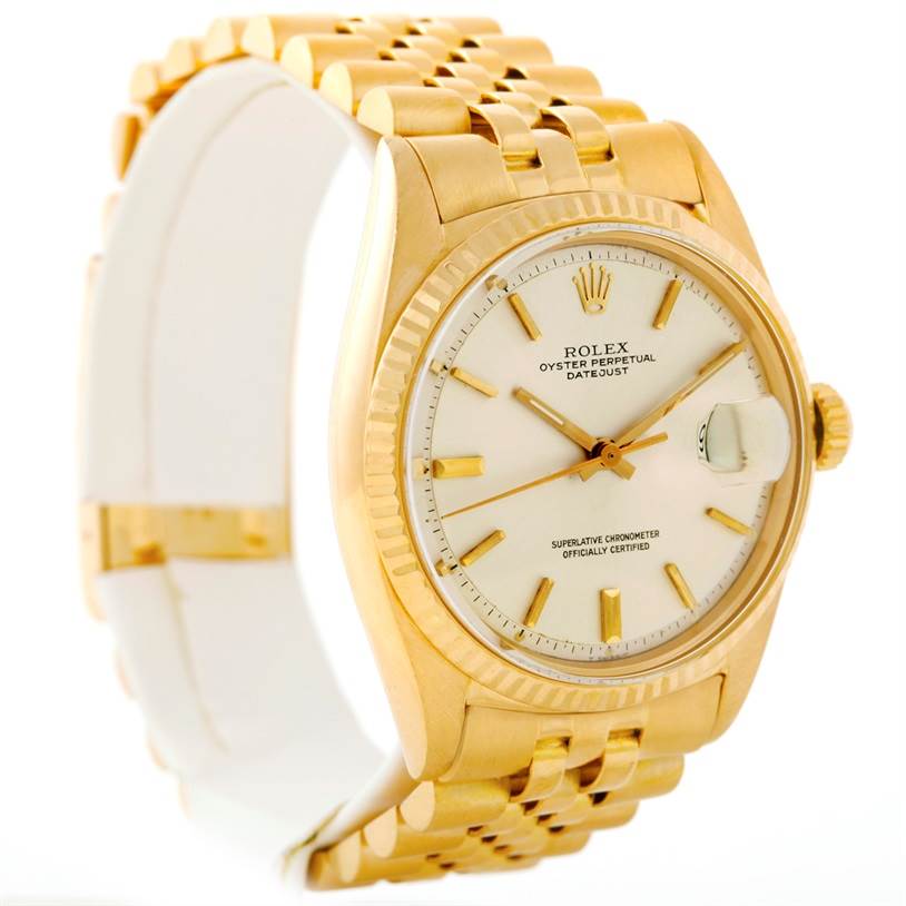 The image shows a three-quarter angle of a Rolex Vintage Collection 1601 Men's Yellow Gold Silver Dial 1601 Men's Yellow Gold Silver Dial Datejust watch, highlighting the dial, bezel, and bracelet.