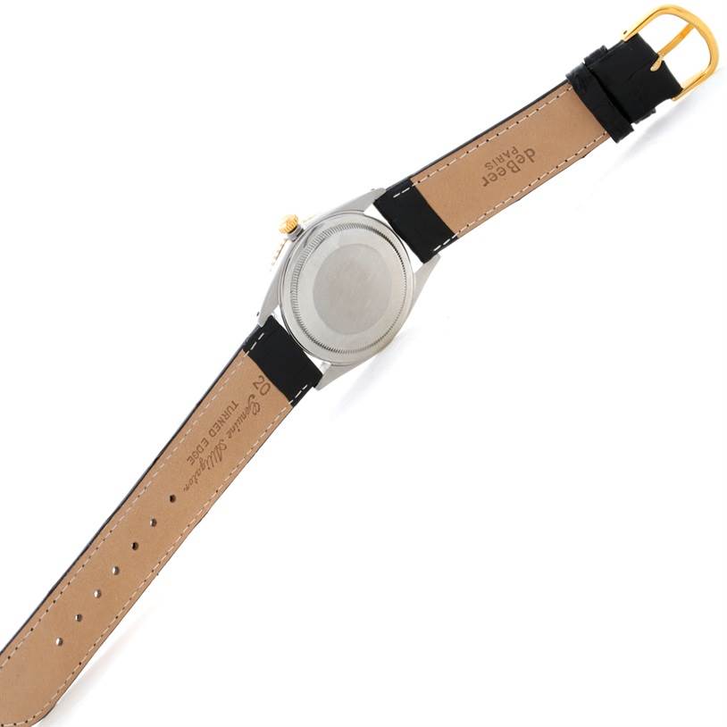 The image shows the back view of the Rolex Vintage Collection 1625 Men's Steel and Gold (two tone) Silver Dial 1625 Men's Steel and Gold (two tone) Silver Dial model, highlighting the case back and leather strap.