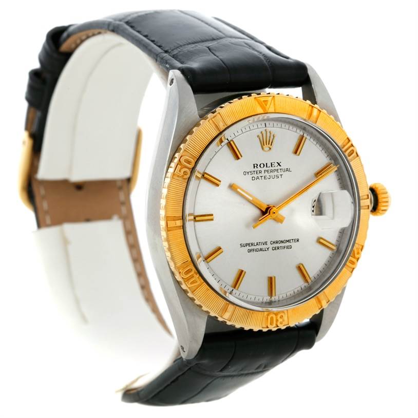 The Rolex Vintage Collection 1625 Men's Steel and Gold (two tone) Silver Dial 1625 Men's Steel and Gold (two tone) Silver Dial watch is shown at a three-quarter angle, featuring its face, bezel, crown, and leather strap.