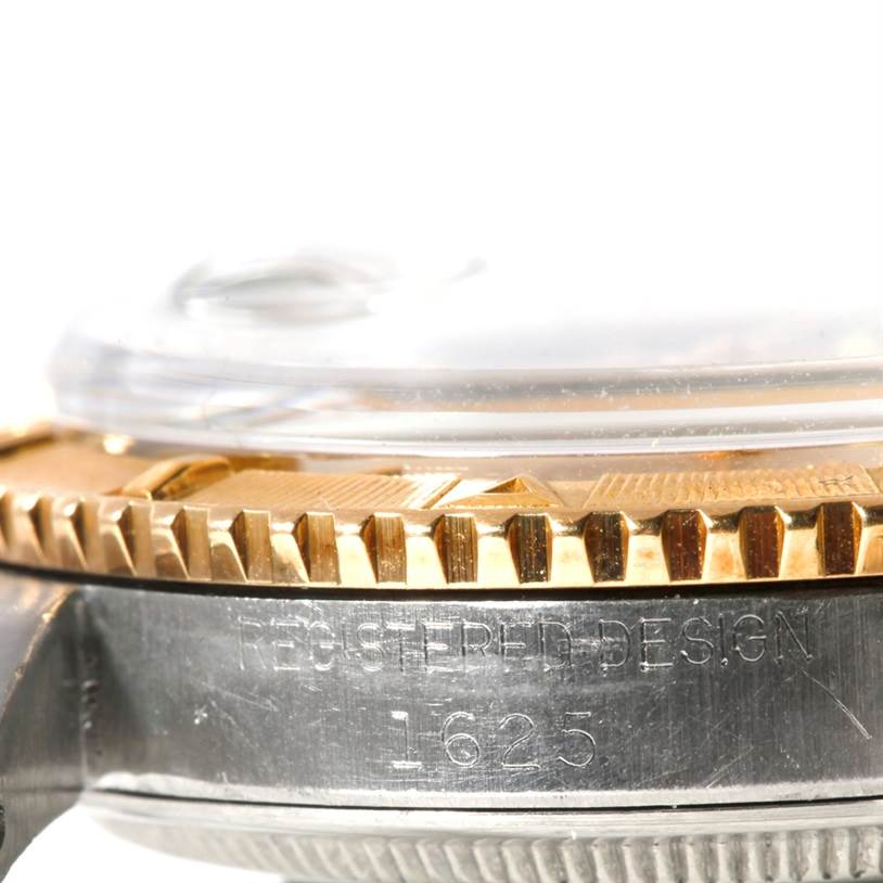 This image shows a close-up of the side of the Rolex Vintage Collection 1625 Men's Steel and Gold (two tone) Silver Dial 1625 Men's Steel and Gold (two tone) Silver Dial Model 1625, highlighting the bezel and the watch case.