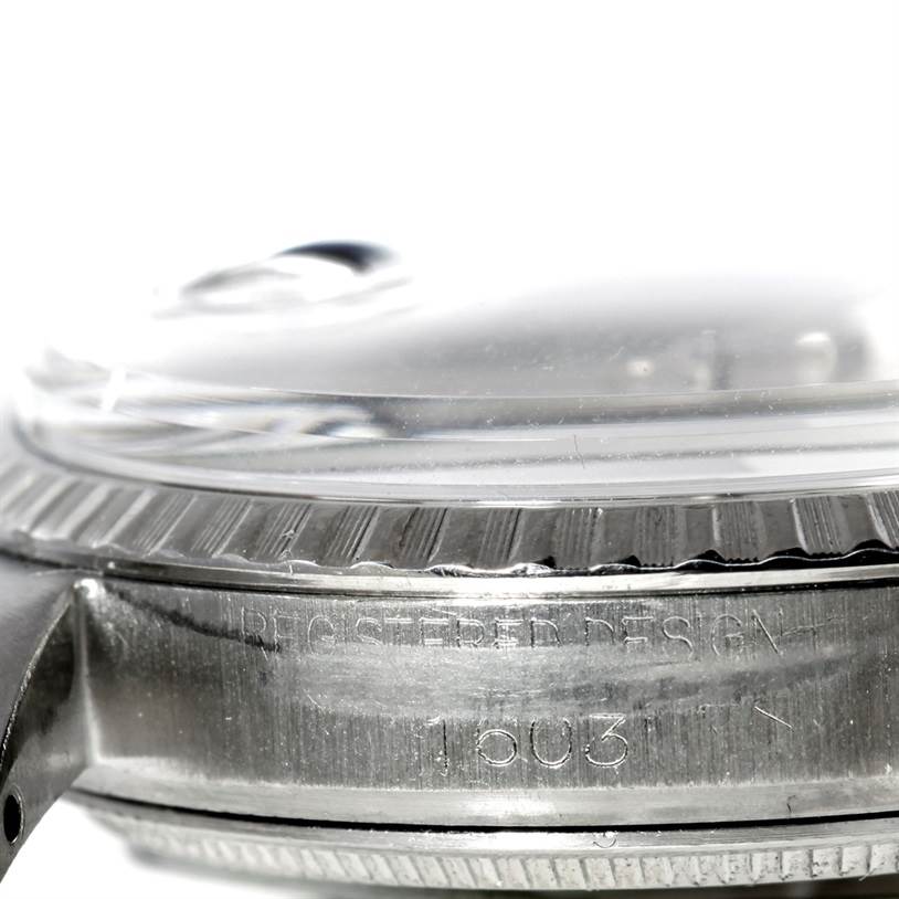 The close-up angle shows the side of the Rolex Vintage Collection 1603 Men's Stainless Steel Silver Dial 1603 Men's Stainless Steel Silver Dial watch, highlighting the bezel and engravings.