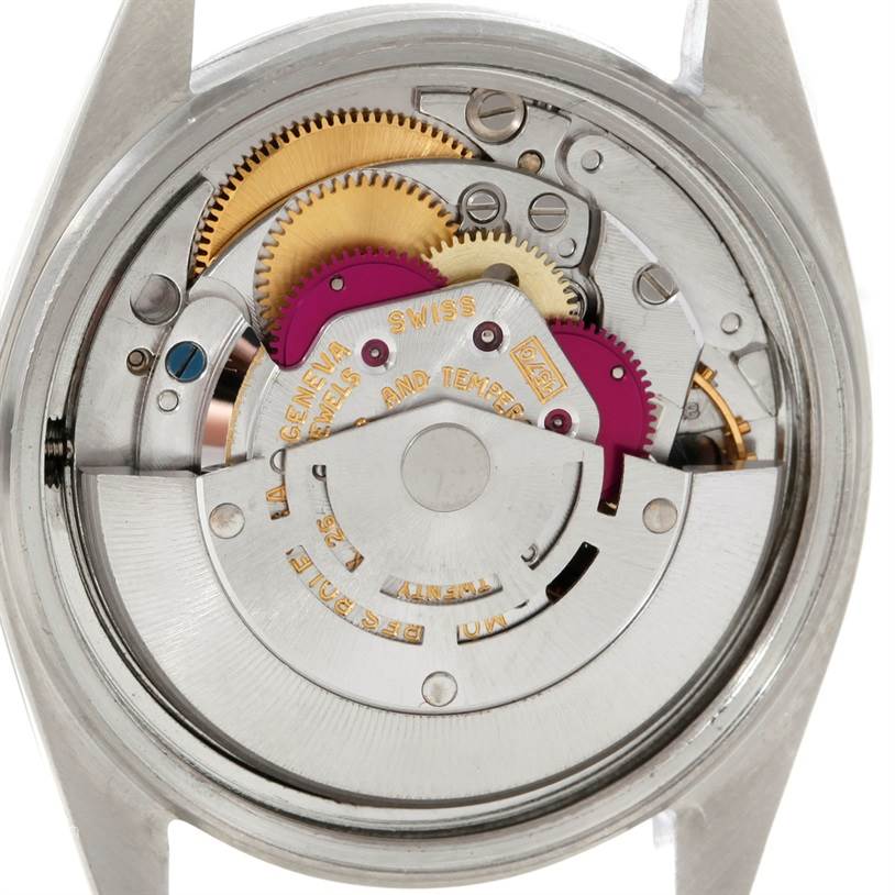 This image shows the inner mechanical movement of the Vintage Collection model watch by Rolex, viewed from the backside.