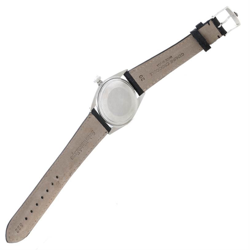 This image shows the back case and leather strap of a Rolex Vintage Collection 1603 Men's Stainless Steel Silver Dial 1603 Men's Stainless Steel Silver Dial watch.