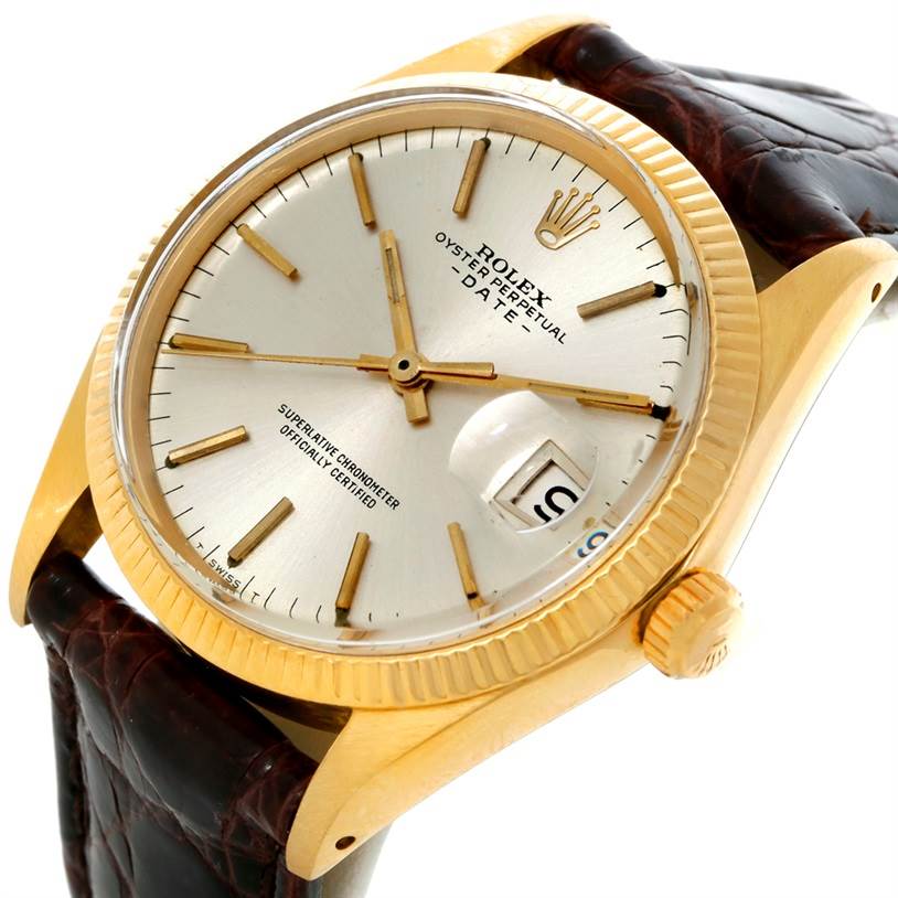 This image shows a close-up, angled view of a Rolex Vintage Collection 1503 Men's Yellow Gold Silver Dial 1503 Men's Yellow Gold Silver Dial model, highlighting the watch face, crown, and leather strap.