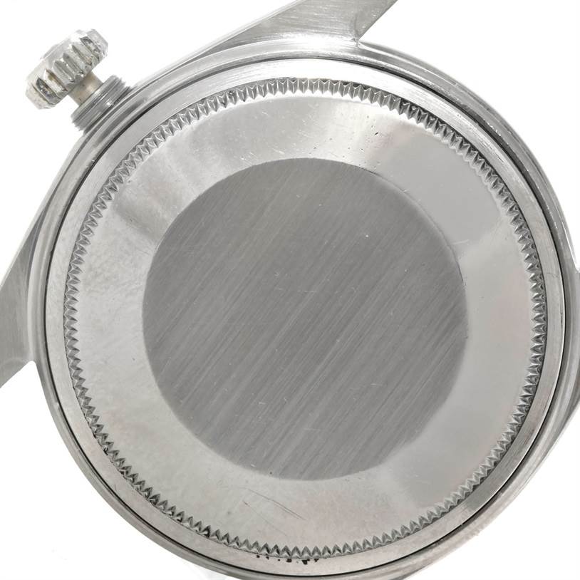 The image shows the back casing and crown of a Rolex Vintage Collection 1603 Men's Stainless Steel Silver Dial 1603 Men's Stainless Steel Silver Dial model watch, viewed from the back.