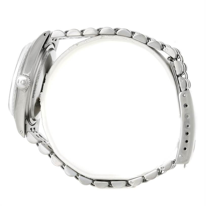 The image shows the side profile and bracelet of a Rolex Vintage Collection 1603 Men's Stainless Steel Silver Dial 1603 Men's Stainless Steel Silver Dial model watch.