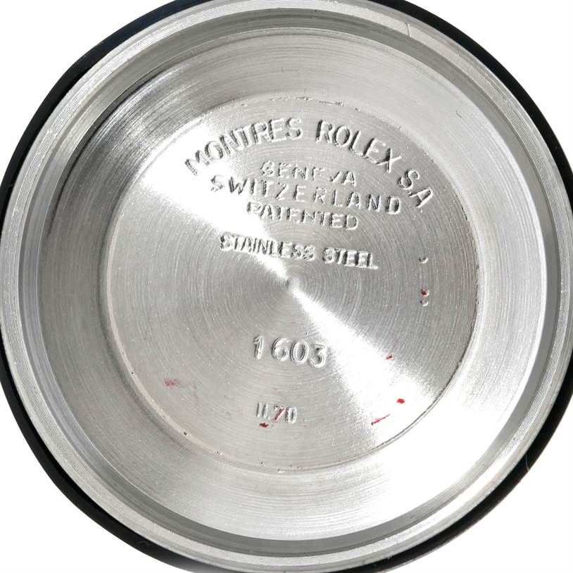 This is the inside view of the case back from a Vintage Collection Rolex model 1603, showing engraving details and markings.