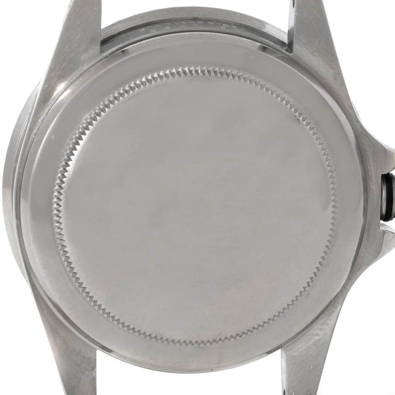 The image shows the case back of a Vintage Collection model by Rolex, viewed from the rear side.