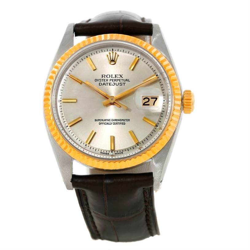 The image shows a front view of the Rolex Vintage Collection 1601 Men's Stainless Steel Silver Dial 1601 Men's Stainless Steel Silver Dial Oyster Perpetual Datejust watch, highlighting the dial, bezel, and leather strap.