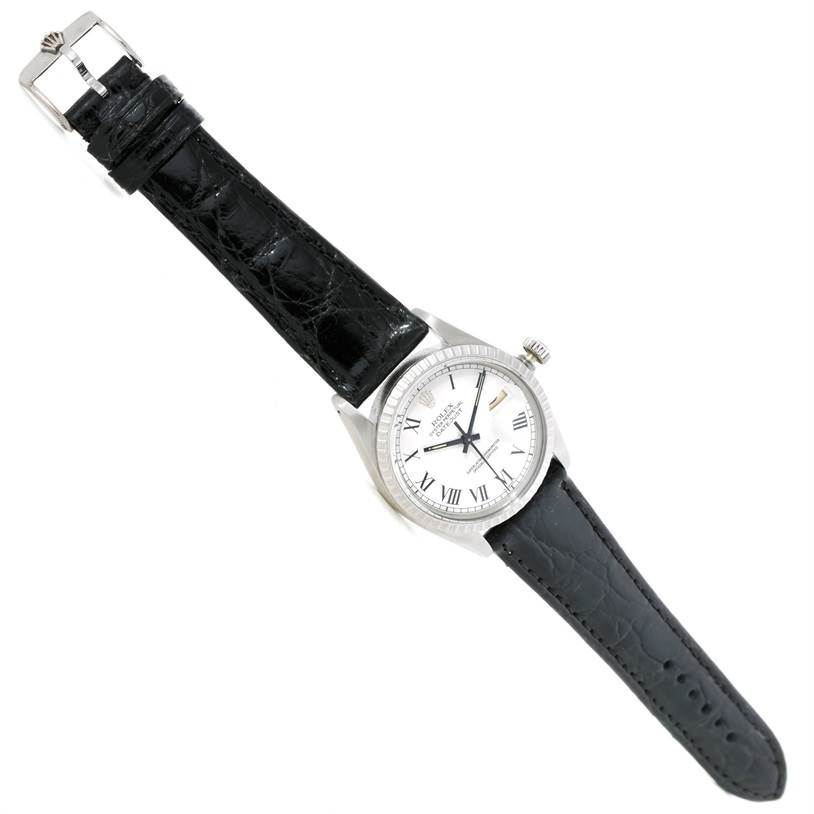 The image shows a Rolex Vintage Collection 16030 Men's Stainless Steel White Dial 16030 Men's Stainless Steel White Dial watch with a black leather strap and white dial, viewed from a top-down angle.