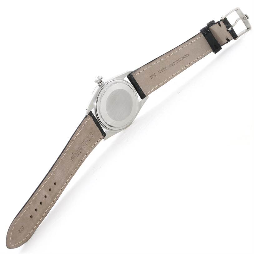 The Rolex Vintage Collection 16030 Men's Stainless Steel White Dial 16030 Men's Stainless Steel White Dial watch is shown from the back, featuring the case back and leather strap.