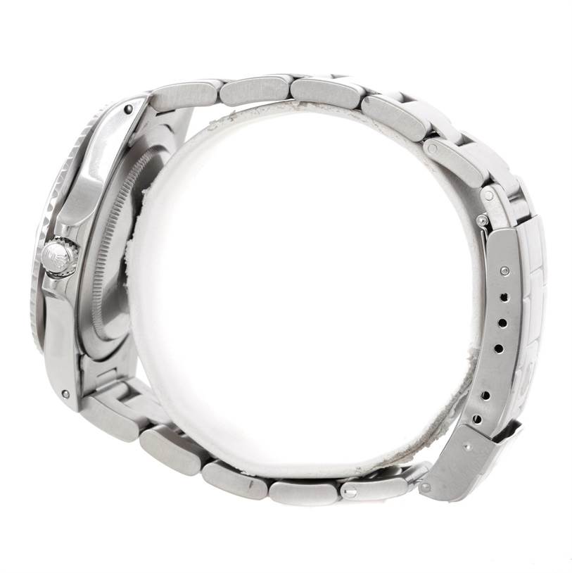 This image shows a side view of a Rolex Vintage Collection 16750 Men's Stainless Steel Black Dial 16750 Men's Stainless Steel Black Dial watch highlighting the bracelet and crown.