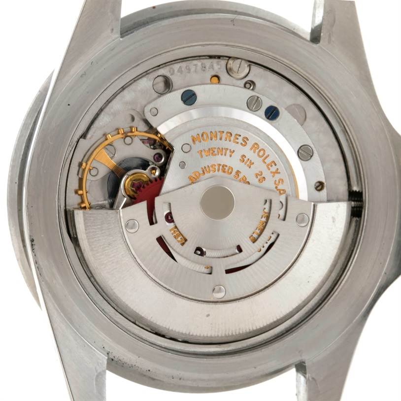 This image shows the internal mechanism and movement of the Rolex Vintage Collection 1680 Men's Stainless Steel Black Dial 1680 Men's Stainless Steel Black Dial watch from a back angle.