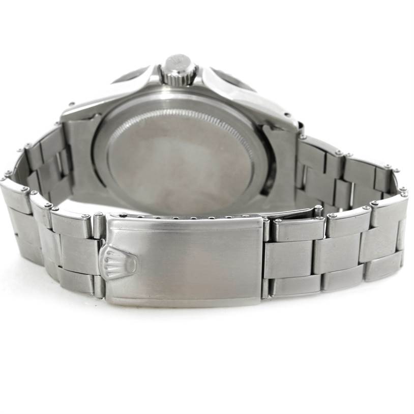 The image shows the back view of the Rolex Vintage Collection 1680 Men's Stainless Steel Black Dial 1680 Men's Stainless Steel Black Dial watch, highlighting its clasp and case back.