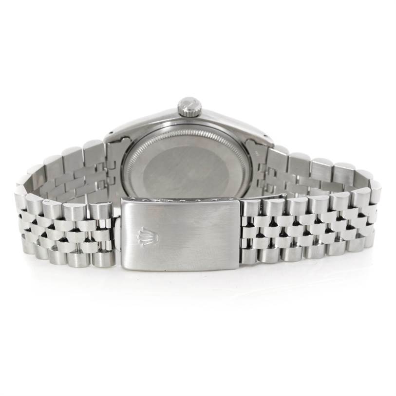 This image shows the back and clasp of a Rolex Vintage Collection 1601 Men's Stainless Steel Silver Dial 1601 Men's Stainless Steel Silver Dial watch, highlighting its stainless steel bracelet.