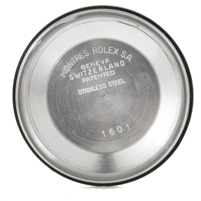 This image shows the inside case back of a Rolex Vintage Collection 1601 Men's Stainless Steel Silver Dial 1601 Men's Stainless Steel Silver Dial model, displaying branding and model number 1601.