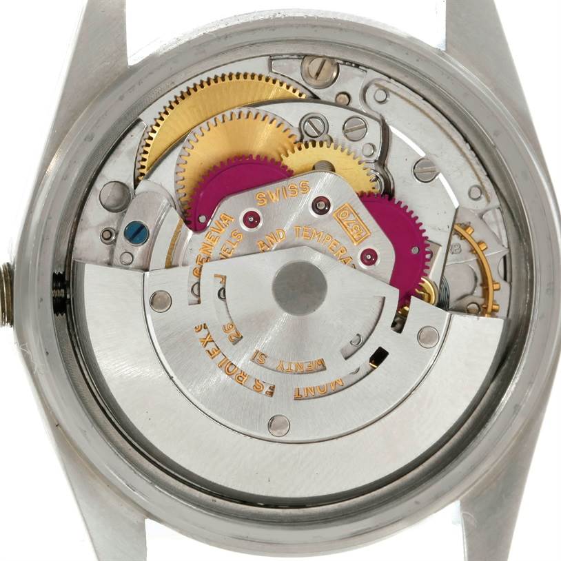 The image shows the inner mechanical movement of a Rolex Vintage Collection 1601 Men's Stainless Steel Silver Dial 1601 Men's Stainless Steel Silver Dial model watch from a back view with the caseback removed.